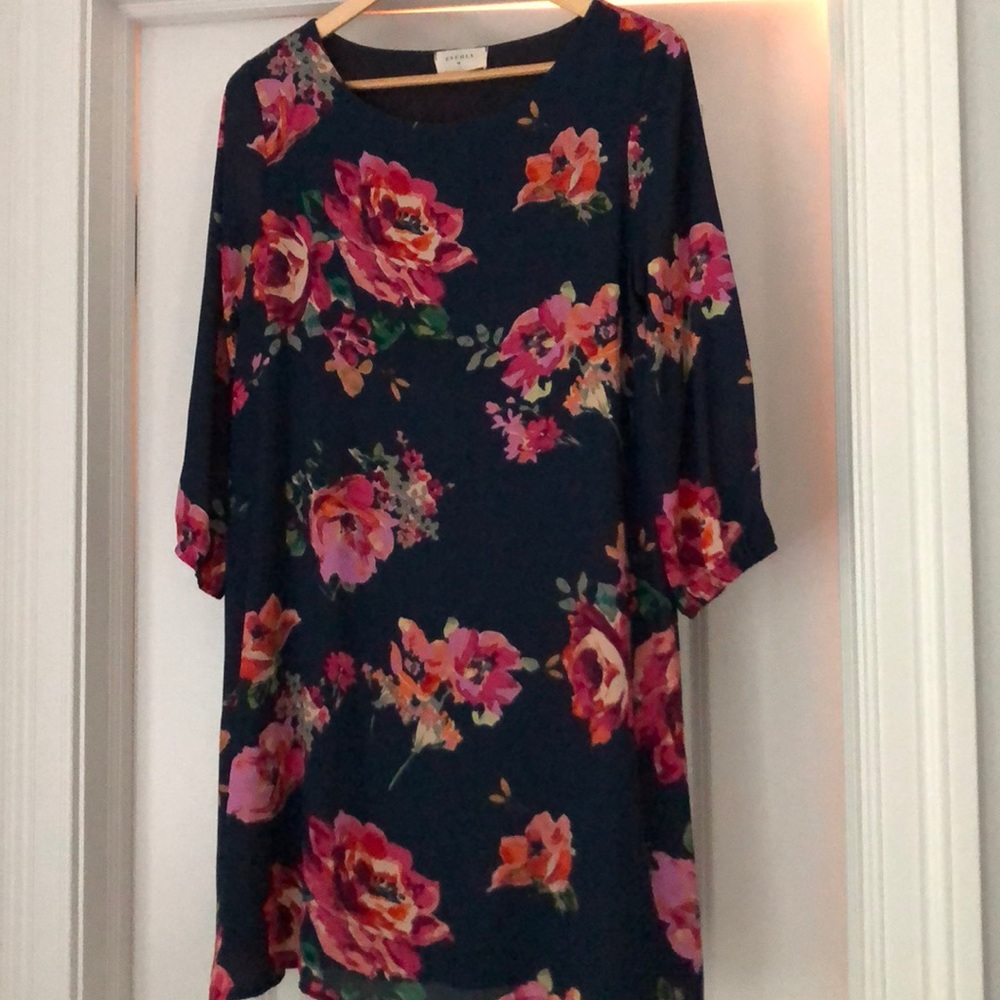 Beautiful floral dress.Lined. Excellent.Almost new
